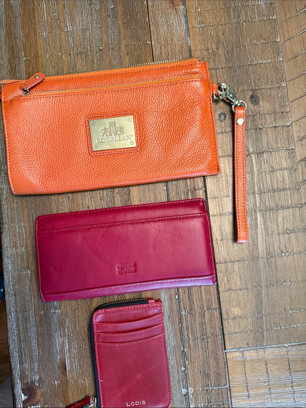 Rowallan Orange Pebbled Leather Zip Wristlet with Gold Plaque